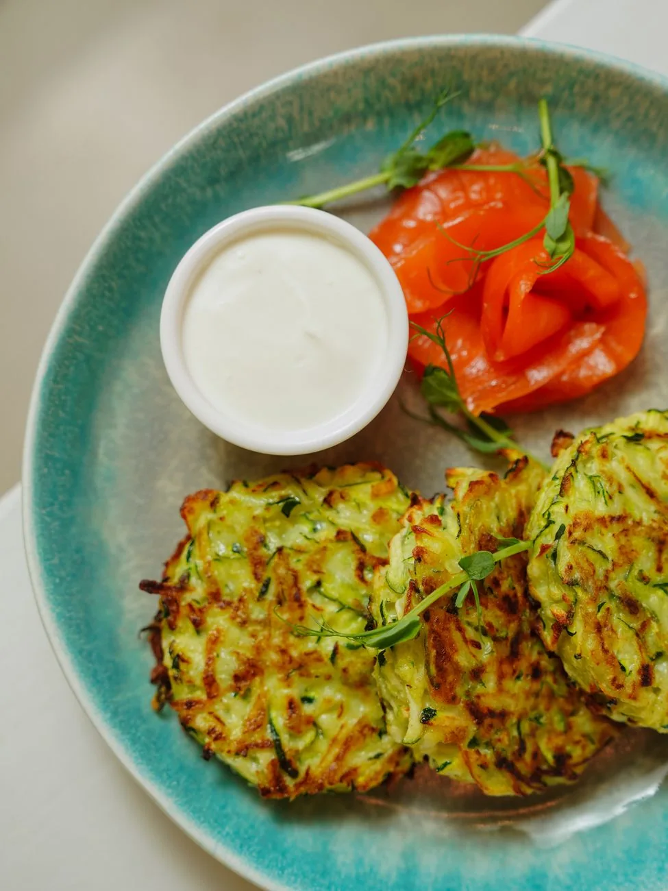 Serving inspiration for Crispy Zucchini Feta Fritters