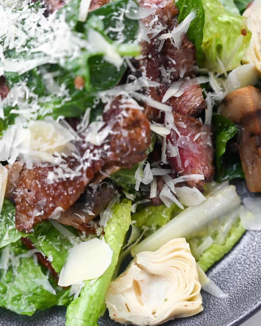 Serving inspiration for Steak Arugula Parmesan Salad